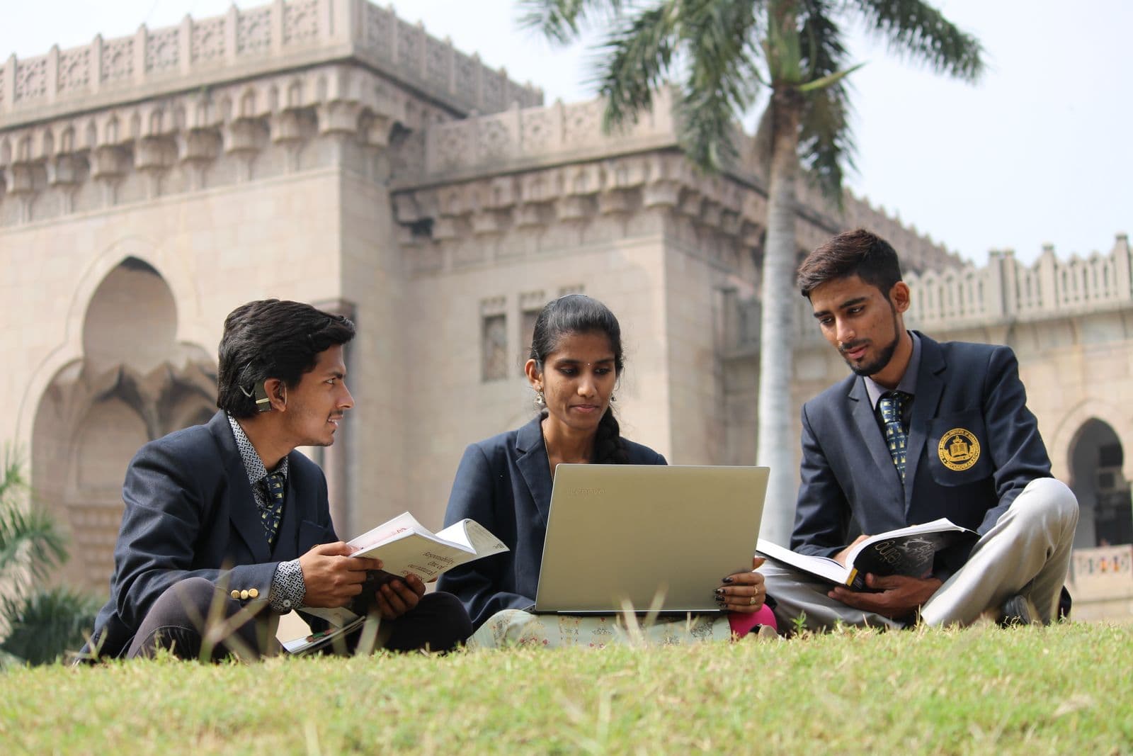 Indian university students working together on a practical technical assignment